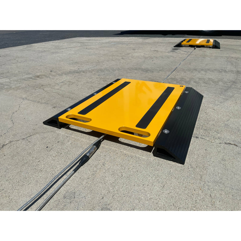 Stainless steel shielded cable attached with a weigh pad to weigh vehicles